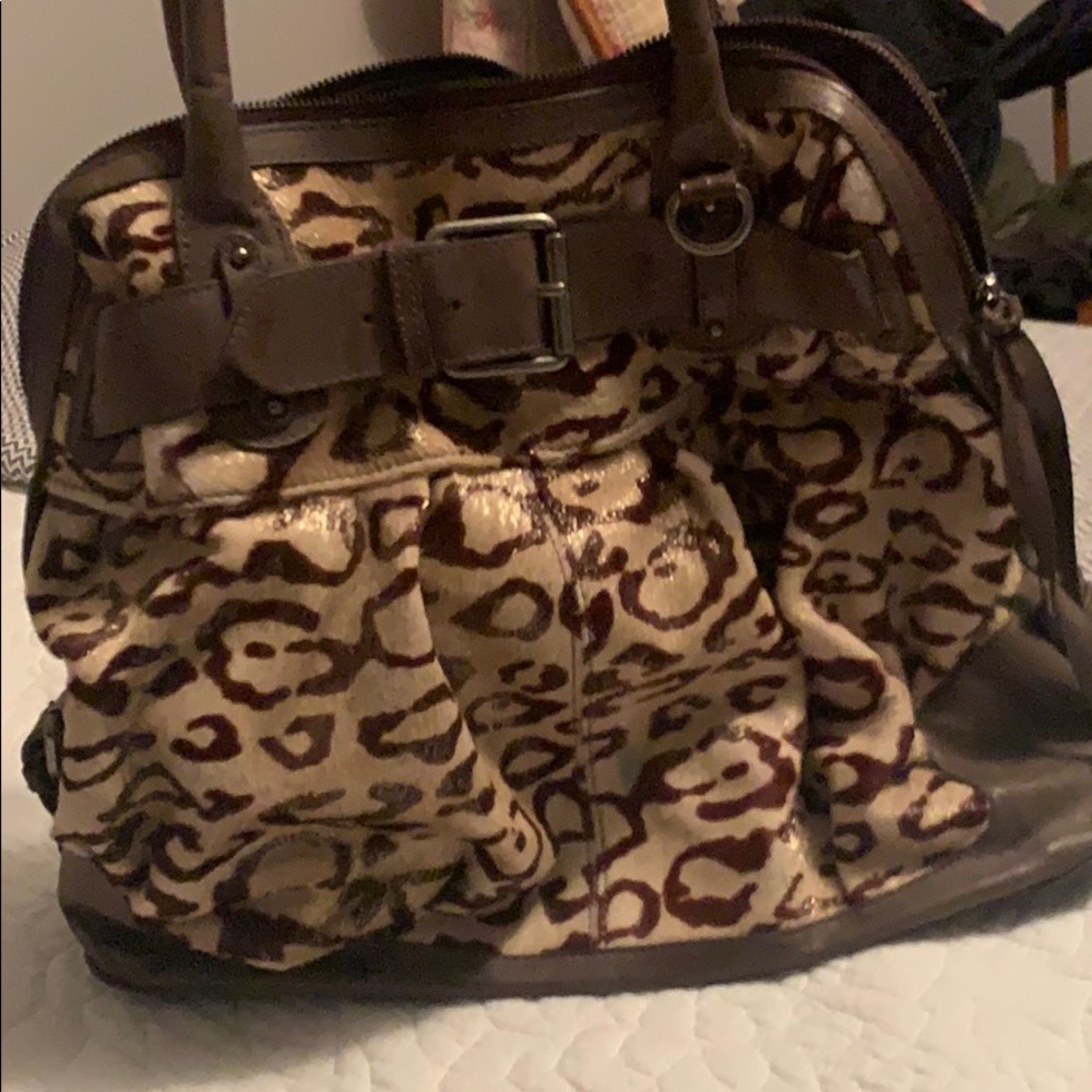 Dulce 100% leather cheetah print handbag